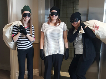 Bank of Washington employees dressed as bank robbers for halloween 2016