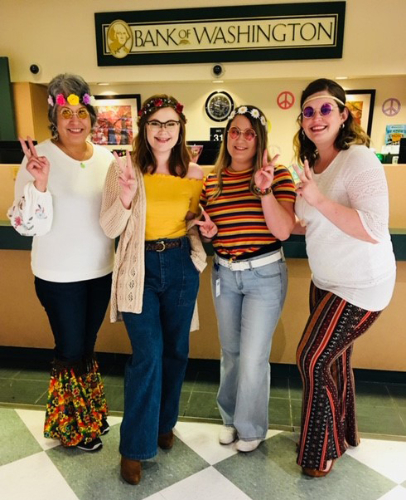 Bank of Washington employees dressed up as hippies for Halloween 2018