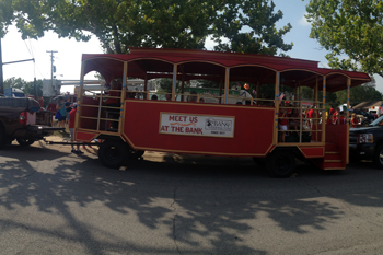 Red trolley in the fair parade