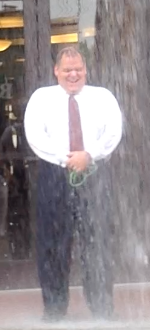Bank of Washington president getting buckets of ice water poured on him during Ice Bucket Challenge