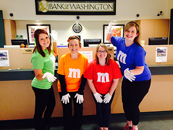 Bank of Washington employees dressed up as M&M's for Halloween 2015