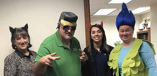 Bank of Washington employees dressed up as cat, Elvis, devil, and Troll for Halloween 2017
