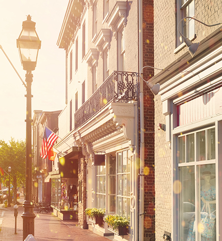 Main Street with American flag with golden sunlight
